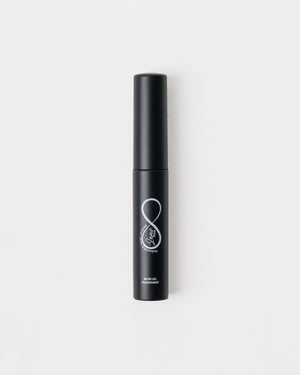 Transparent brow gel by Theris, showing the clear, smooth gel formula in a sleek tube for natural-looking brow setting.