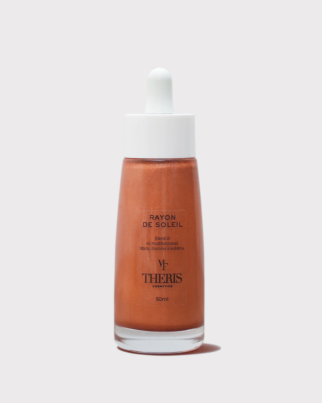 Shimmering Rayon De Soleil Olio Illuminante by Theris, displayed in a sleek bottle with a luminous glow.